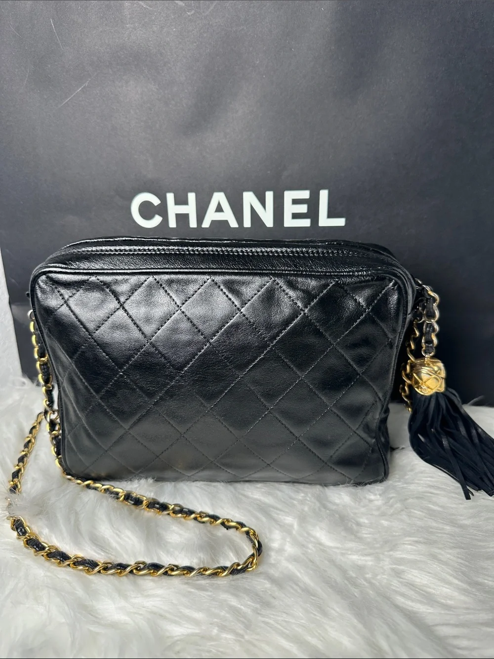 CHANEL Black Quilted Lambskin Crossbody with Tassel and Chain